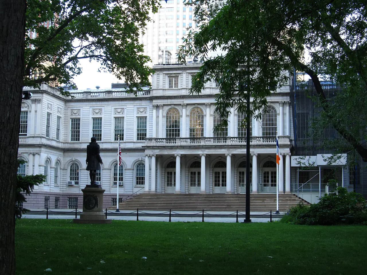 The facade of New York City Hall in City Hall Park, Lower Manhattan