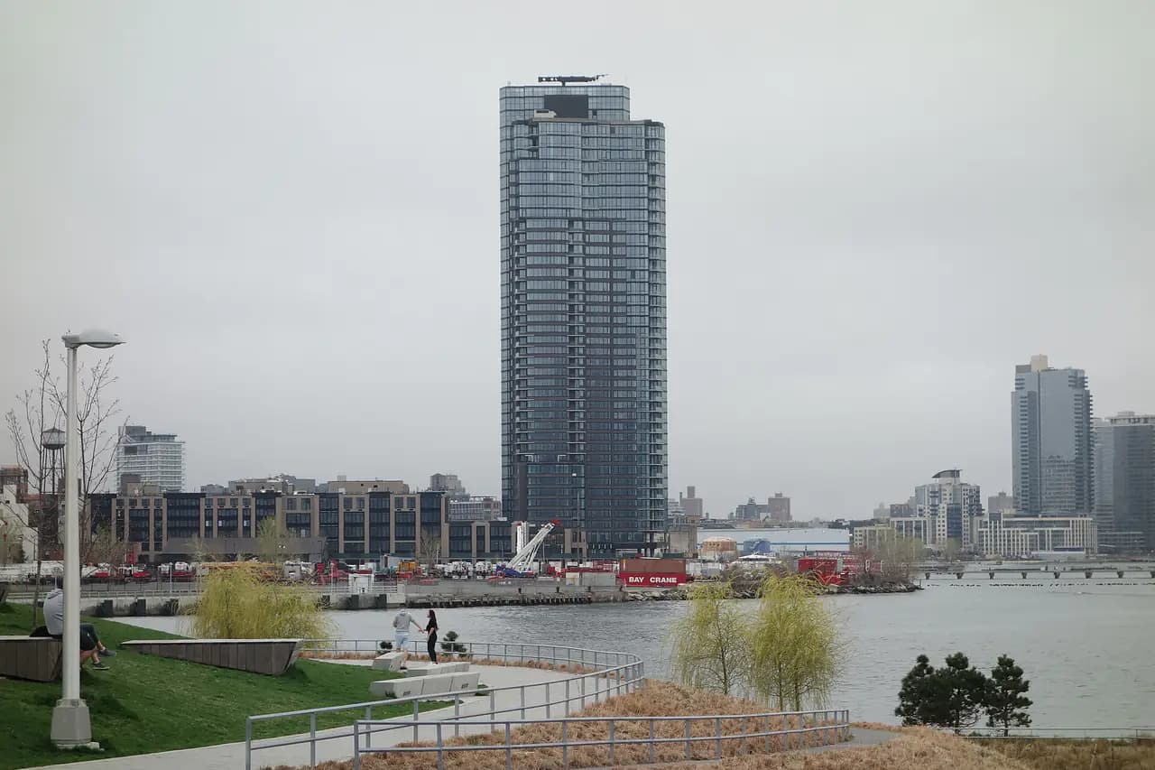 The Greenpoint residential tower at 21 India Street in Greenpoint, Brooklyn, seen from Hunter's Point South Park