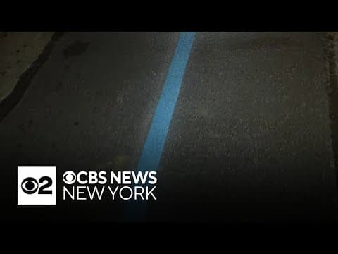 Video: Crews paint the blue line marking the NYC Marathon route
