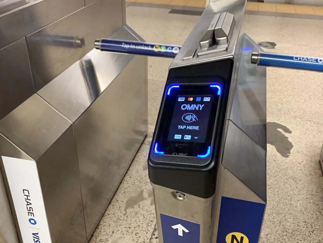 Close-up of an OMNY contactless reader on a New York City Subway turnstile
