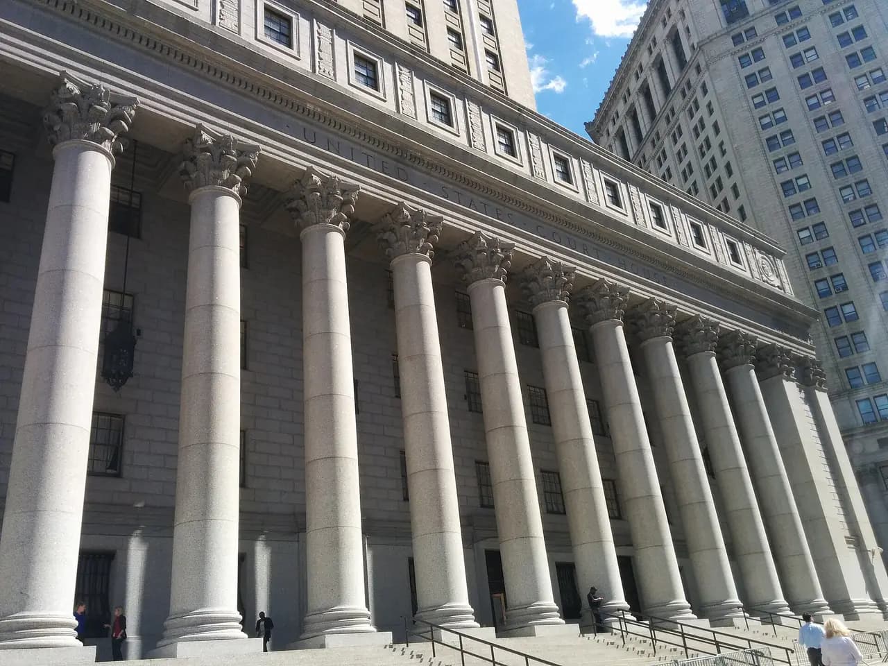 The tall granite tower of the Thurgood Marshall U.S. Courthouse on Foley Square in Lower Manhattan