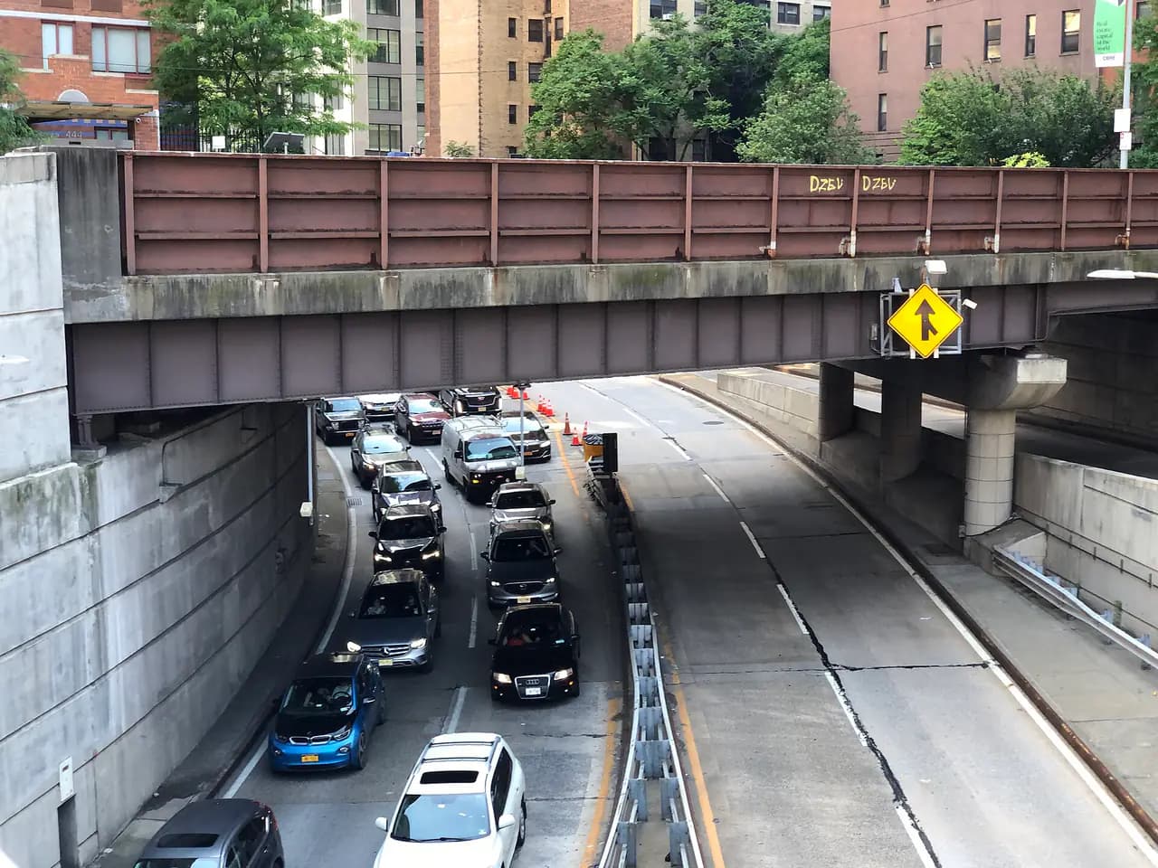 Traffic on the sunken Lincoln Tunnel Expressway approach in Manhattan, seen from the Dyer Avenue overpass