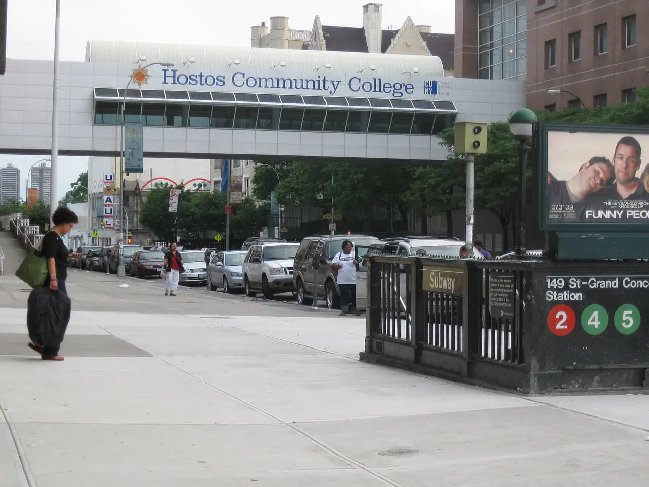 The Hostos Community College pedestrian bridge over the Grand Concourse in the South Bronx, with the college's name on its side