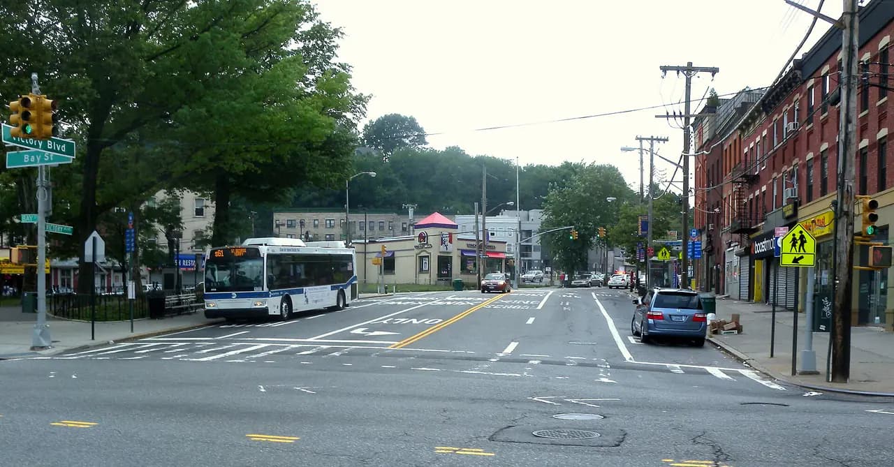 A city bus at the corner of Victory Boulevard and Bay Street in Tompkinsville, Staten Island