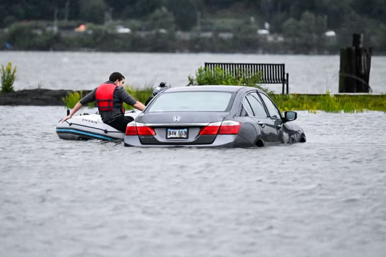 Heavy rain and strong winds battered the northeastern U.S. as an unusually powerful autumn storm intensified.