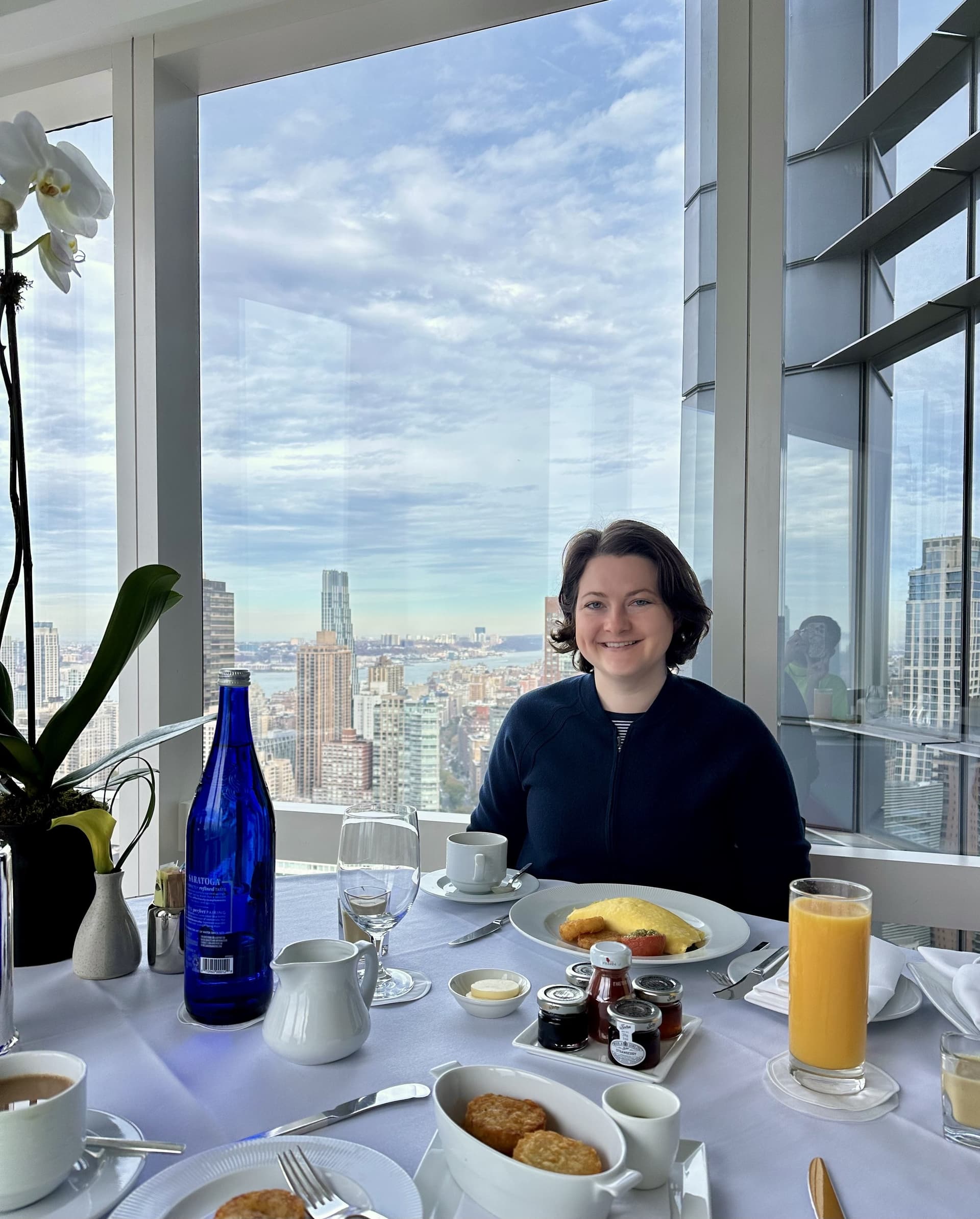The writer of this story poses with breakfast food.
