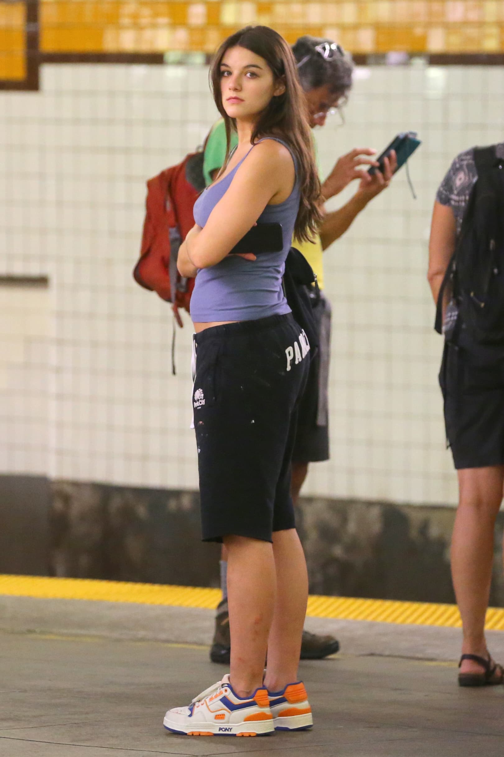 Suri Cruise Waiting for the Subway in NYC